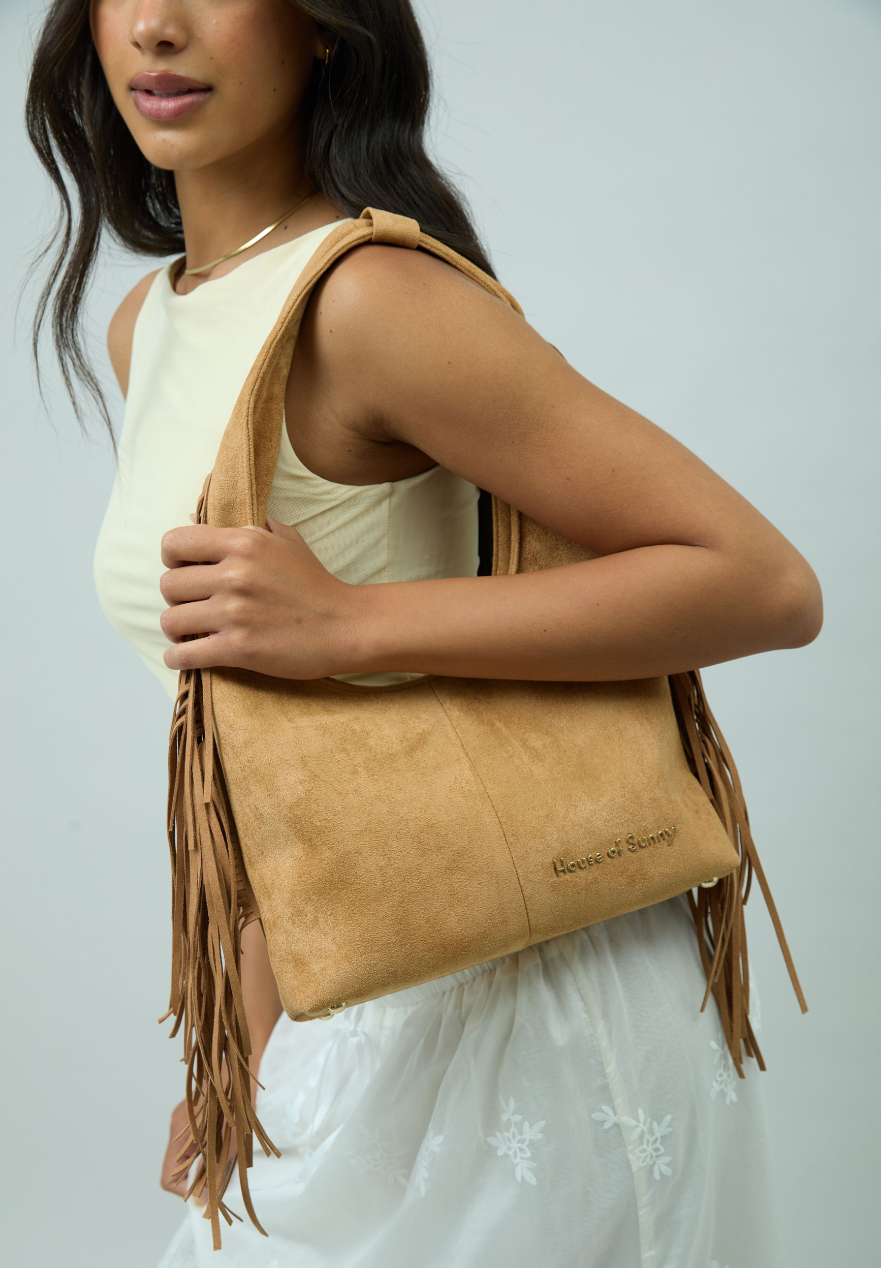TASSEL SLING BAG