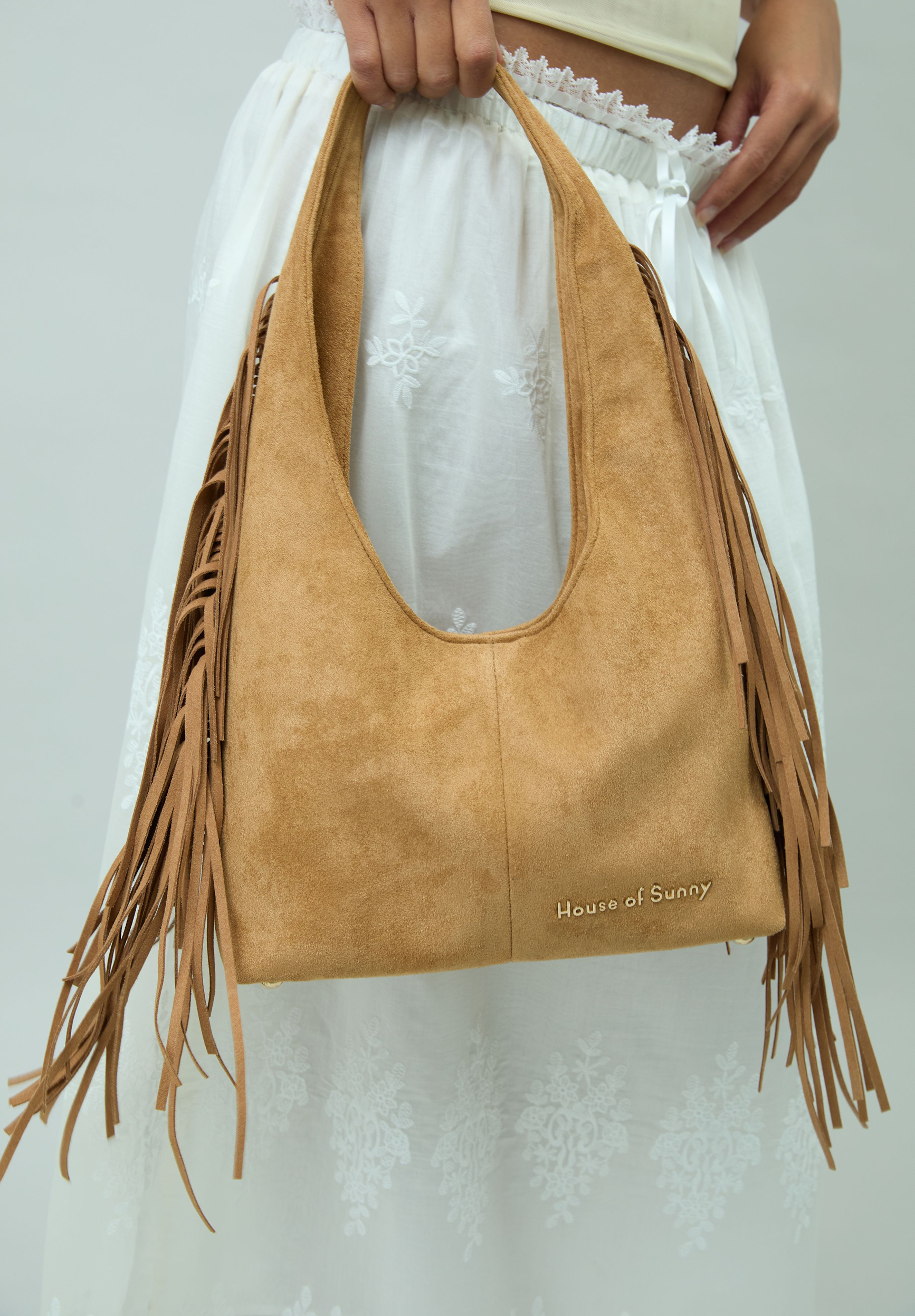 TASSEL SLING BAG