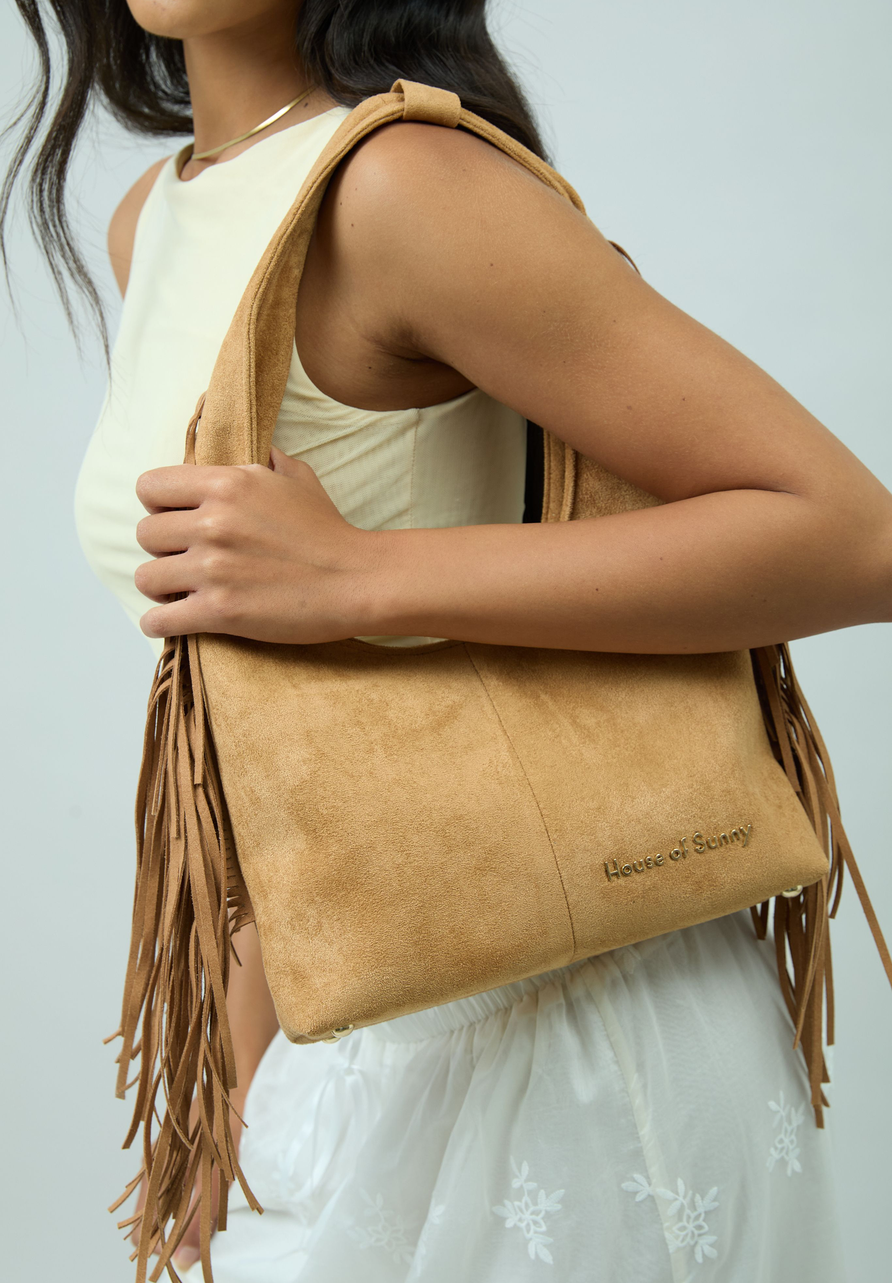 TASSEL SLING BAG