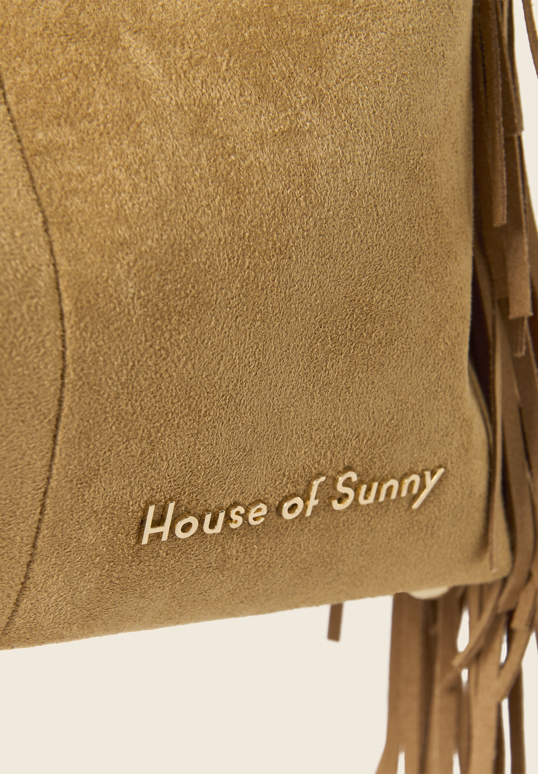 TASSEL SLING BAG